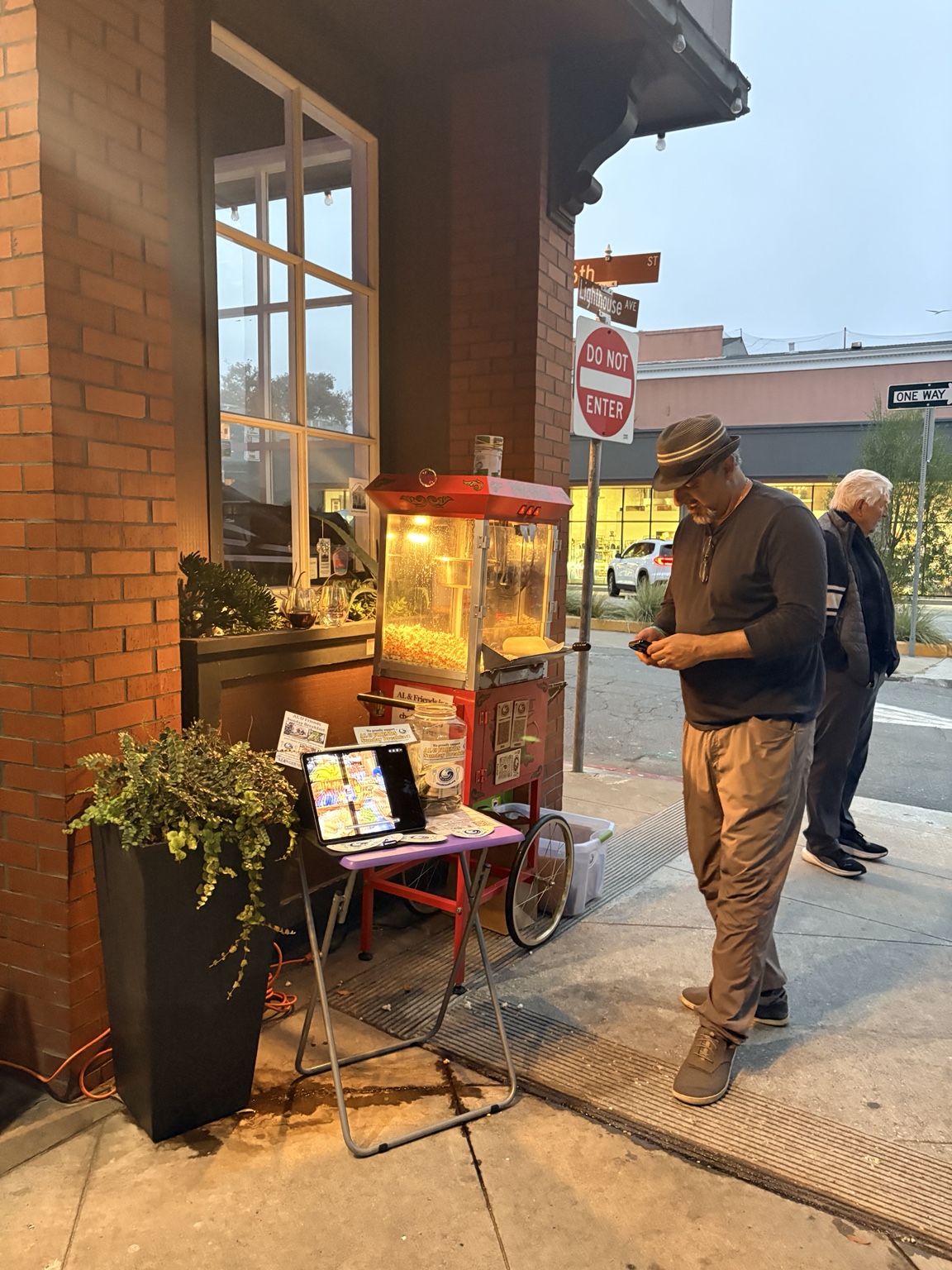 Al and Friends popcorn cart outside the PG Meetinghouse at Lighthouse Avenue and 6th Street